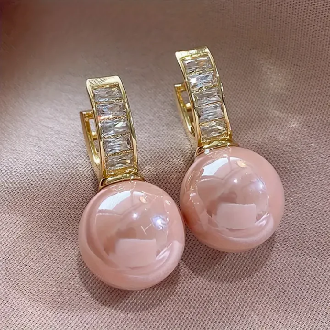 Zlatne minđuše sa roze biserom